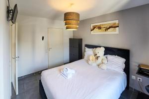 Appartements Les Vergers - Calme, Piscine, Parking & Terrasse : photos des chambres