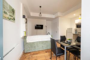 Appartements Le Doux Sejour : photos des chambres