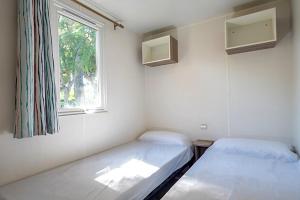 Campings Homair Mobil-homes Camping Les Avignon : photos des chambres