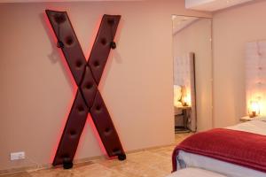 B&B / Chambres d'hotes Loveroom de charme avec jacuzzi et sauna : photos des chambres