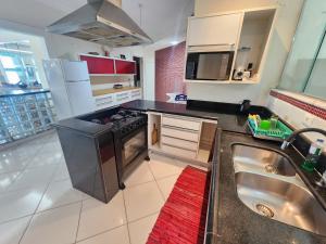 Enorme apto Frente ao mar 4 suites AC , churrasqueira privativa