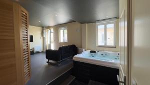 Magnifique loveroom avec sauna, spa et cinémaroom