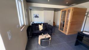 Magnifique loveroom avec sauna, spa et cinémaroom