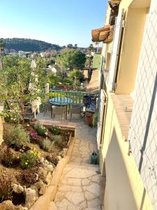 Appartements maison en duplex avec jardin : photos des chambres