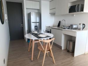 HOM I Depto 1D1B Frente al Mall con Terraza Vista al Mar 2312