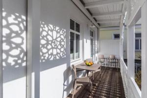 Villa Iduna Ferienwohnung No 10 - EG mit Balkon nach Osten