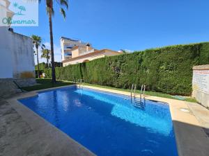 Olivamar casa Picasso con piscina comunitaria