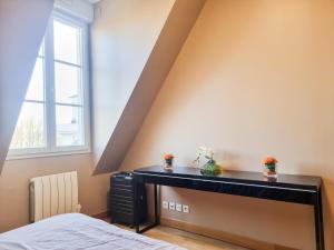 Appartements EXIGEHOME appartement de standing centre ville 3 chambres : photos des chambres