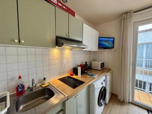 Appartements Studio Le Tigre Cosy Centre : photos des chambres