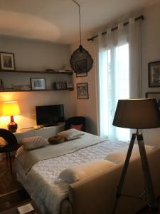 Appartements Appartement ancien cosy : photos des chambres