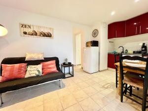 Appartements Le Coin de Mer 1 - Bord de mer, CLIM, WIFI, 4 pers : photos des chambres