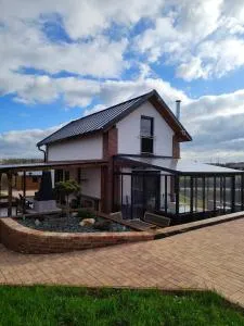 Chata Vyžice s bazénem se zimní zahradou a posezením - Vyžice