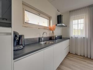 Villa with hot tub and sauna, on a holiday park