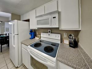 Palms at Cove View 1201 - Babes Place