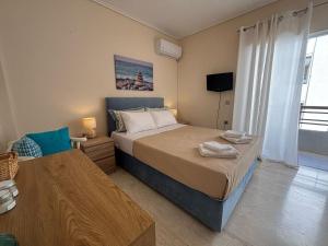 Cozy & Quiet Seaside apartment - Ubytování bez kategorie ve městě Loutraki
