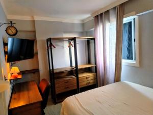Queen l Ar cond l Tvs smart l Wi-fi l Cozinha completa l Garagem