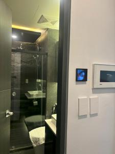 FREE Parking, Sauna, Gym & Pool Access, FAST Wi-Fi, Nespresso Coffee Machine with FREE coffee Pods, Elegant Balcony Over Venice Grand Canal, Walking Distance Brtish Embassy, 5 min drive to BGC, 10 mins drive to Manila Airport Terminal 3