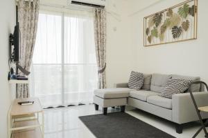 Comfrot 2BR at Sky House BSD Apartment By Travelio