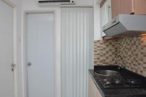Cozy Stay and Comfort 2BR at Bassura Apartment By Travelio