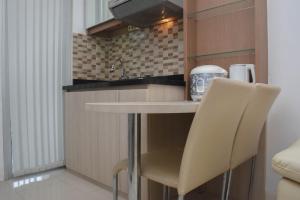 Cozy Stay and Comfort 2BR at Bassura Apartment By Travelio