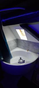 Appartements LoveRoom theme cinema : photos des chambres