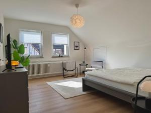 Gemütliches Dach-Apartment in der Stadt - ADAM -