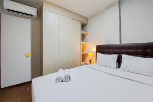 Comfort and Modern 2BR at Asatti Apartment By Travelio