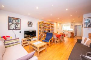 Spacious 2BR w Free Parking Patio Near Tube - Pass the Keys