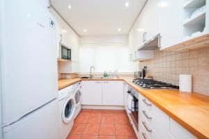 Spacious 2BR w Free Parking Patio Near Tube - Pass the Keys