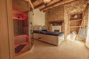 Maisons de vacances Bien-etre & Spa privatif - Spa de nage, sauna, lit hydromassant & relaxation Immersive : photos des chambres