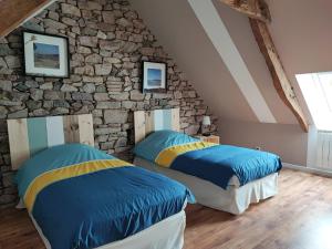 Maisons de vacances Gite du jardin de pierre : photos des chambres