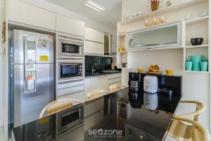 Apto com vista mar lateral, cond beira mar RAP0306