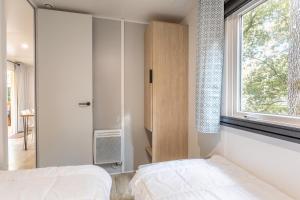 Campings Mobil Home 150 : photos des chambres