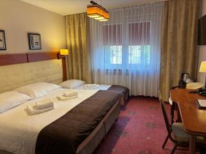 Double Room with Extra Bed room in Cumulus Hotel