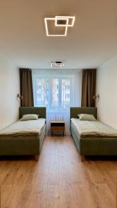 Cozy 2-Bedroom Seaside Apartment