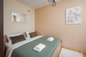 National Stadium Cozy Retreat Apartment by BookingHost