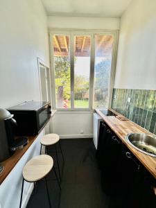 Charmant T2 avec Jardin, Barrière St-Genes