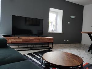 Maisons de vacances Gite du jardin de pierre : photos des chambres
