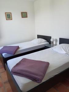 Appartements Villa Les Grenadines RDC : photos des chambres