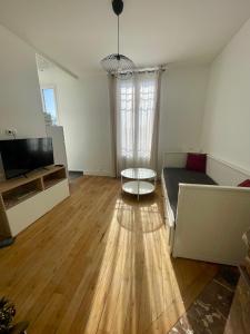Appartements F1 lumineux au coeur d-Argenteuil : photos des chambres