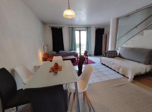 Appartements Duplex en plein centre du village : photos des chambres