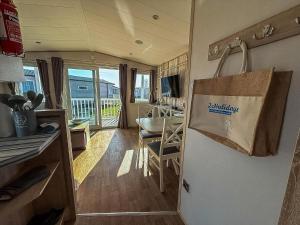 Beautiful 8 Berth Caravan With Decking At Hopton Holiday Village Ref 80016W