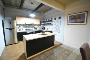 Departamento Runa, amplio, bonito y acogedor, completo de 2 recámaras y 3 camas matrimoniales