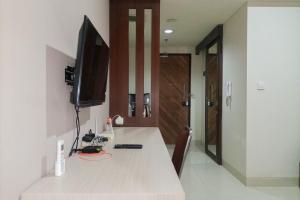 1BR with Cozy Design at Uttara The Icon Apartment By Travelio