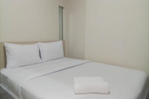 1BR with Cozy Design at Uttara The Icon Apartment By Travelio