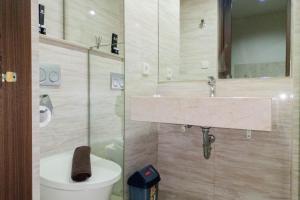 1BR with Cozy Design at Uttara The Icon Apartment By Travelio