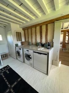 Maisons de vacances Charmante chaumiere : photos des chambres