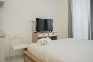 Gorgeous and Comfy Studio Sky House BSD Apartment By Travelio