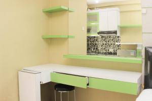 Nice and Comfortable Studio at Bassura City Apartment near Mall By Travelio