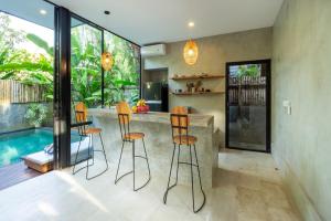 A Rustic Tropical Getaway with an Industrial Flair